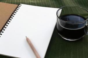 Notebook and coffee photo