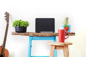 Tablet in home office mock-up photo