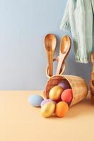 Easter eggs spilling out of a basket