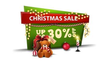 Christmas sale, up to 30 off, green and red discount banner in cartoon style with garland and present with Teddy bear vector