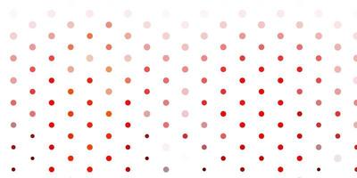 Light red, yellow vector background with spots.