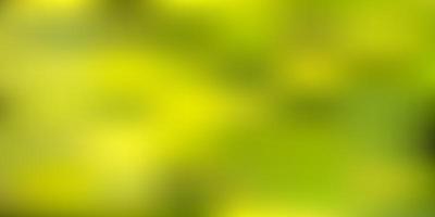 Light green, yellow vector blurred pattern.