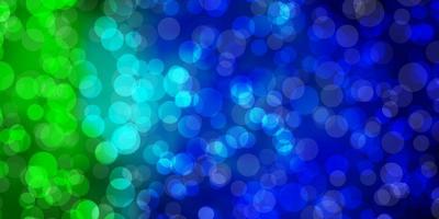 Light Blue, Green vector background with bubbles.