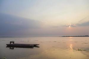 Small boats moored on the lake photo