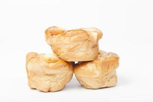 Three pieces of bread on white background photo