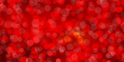 Light Red, Yellow vector background with bubbles.