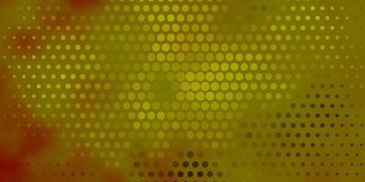 Light Yellow vector background with spots.