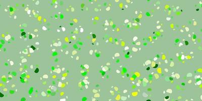 Light green, yellow vector pattern with abstract shapes.