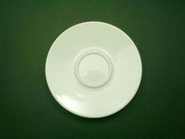 Top view of small white coffee cup saucer photo