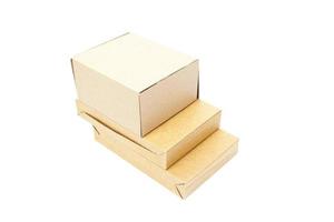 Three brown boxes on white background photo