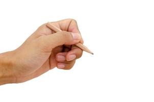 Hand holding pencil on white background photo