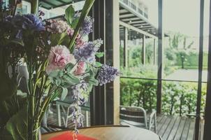 Flower arrangement on an indoor table photo