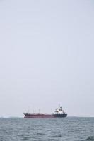 Large cargo ship on the sea photo