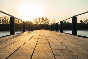 Wooden bridge by the sea photo