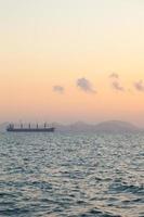 Large cargo ship on the sea photo