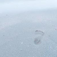 Footprint on the beach photo