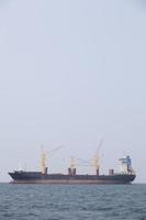 Large cargo ship on the sea photo