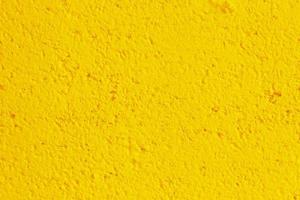 Yellow concrete or cement wall for texture or background photo