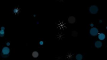 Light circles and stars particles background video