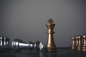 King and knight chess setup on dark background photo