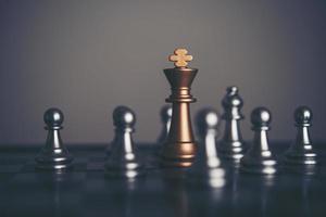 King and knight chess setup on dark background photo