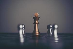 King and knight chess setup on dark background photo