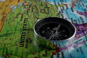 Compass with a map background photo