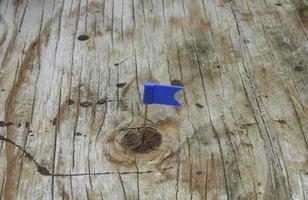 Blue flag on wood photo