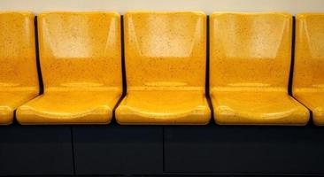 Row of yellow chairs photo