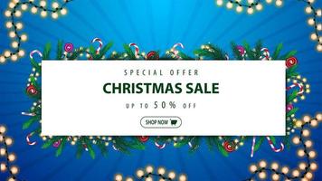 Special offer, Christmas sale, up to 50 off, blue and white discount banner with frame of Christmas tree branches and garlands around a white rectangle with offer and button vector