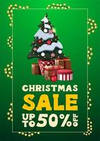 Christmas sale, up to 50 off, green vertical discount banner in minimalistic style with garland frame and Christmas tree and gifts vector