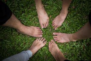 Group of friends with bare feet together