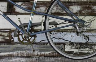 Antique bicycle on wall photo