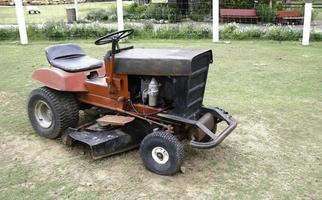 Old mower on grass photo