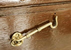 Brass metal window lock photo