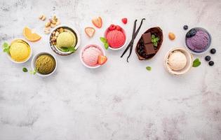 Various of ice cream flavours in bowls photo