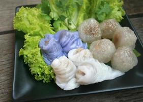 Fresh dumplings on plate photo