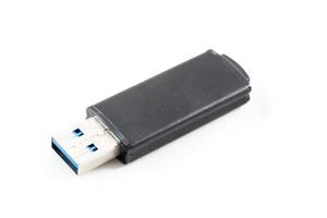 Unidad flash USB sobre un fondo blanco.