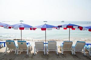 Sunbathing beds and umbrellas in Thailand