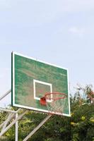 Basketball hoop in the park photo