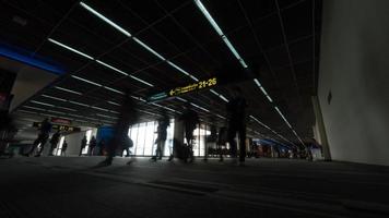 Bangkok, Thailand, 2020 - People walking in airport photo