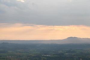 Mountains and forests in the evening photo