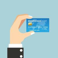 stock vector mano sostiene tarjeta de crédito