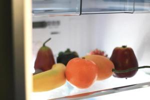 Fruit in refrigerator photo