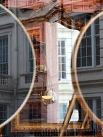 Building reflected in London storefront photo