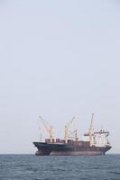 Large cargo ship on the sea photo