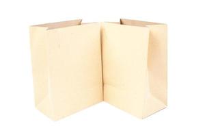 Two brown paper bags on white background photo