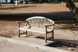 Wooden bench in the park photo