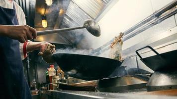 Chef stir frying photo