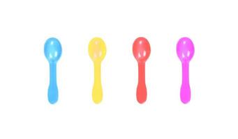 Colorful spoons on white photo